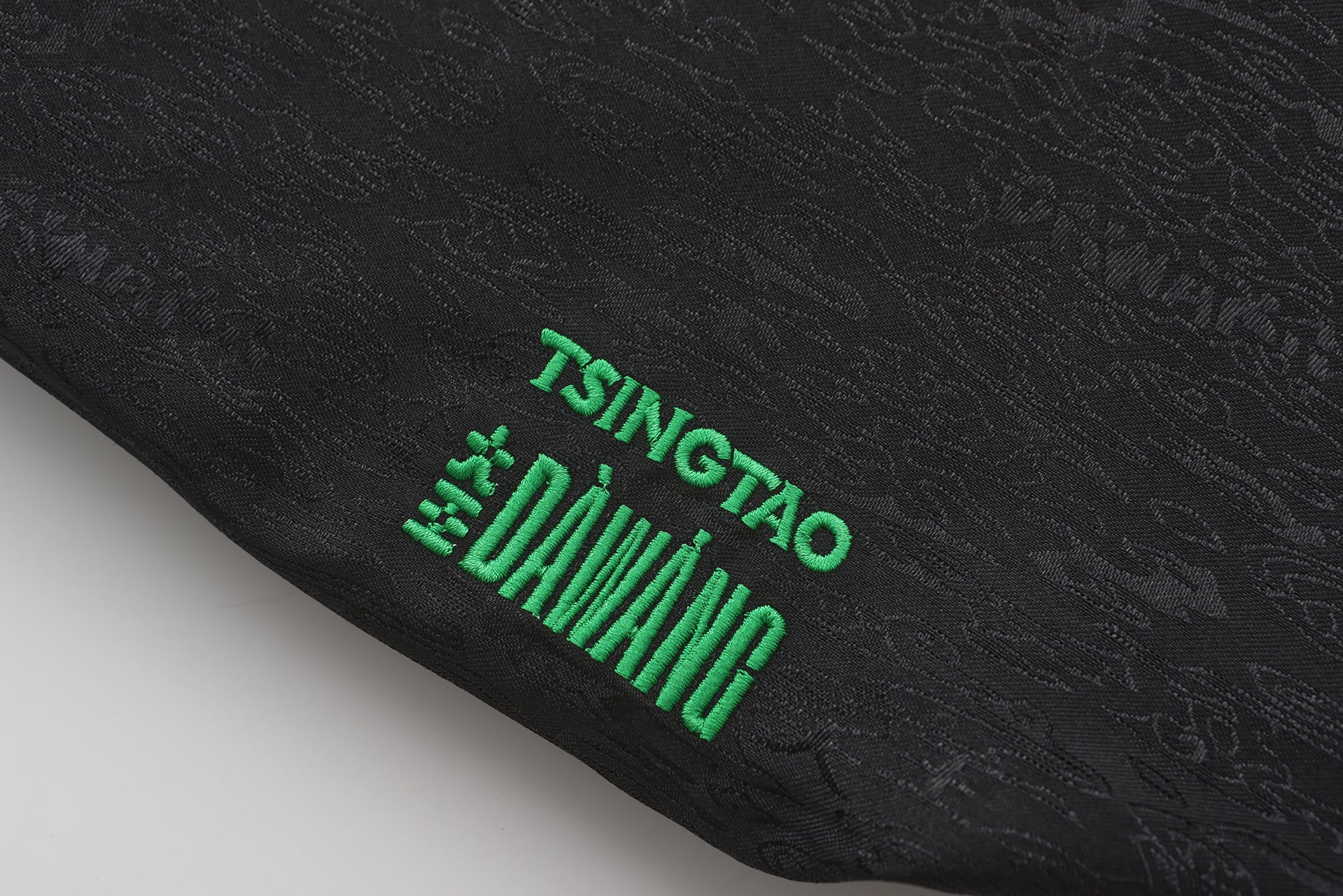 TSINGTAO x DAWANG Reversible Puffer Jacket